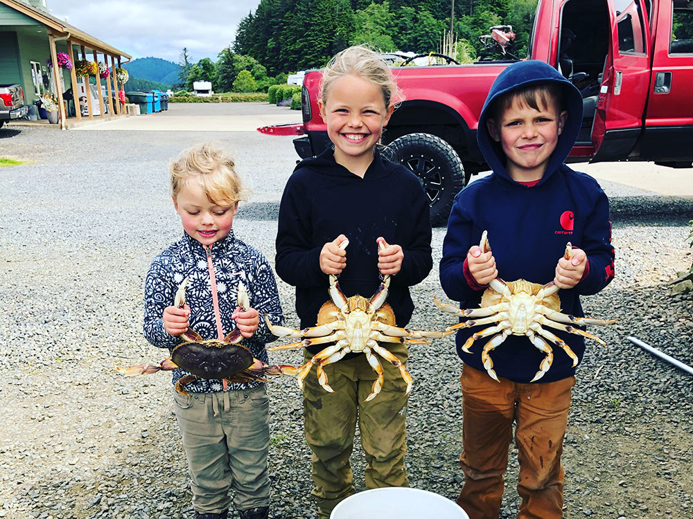 Kids Holding Crabs
