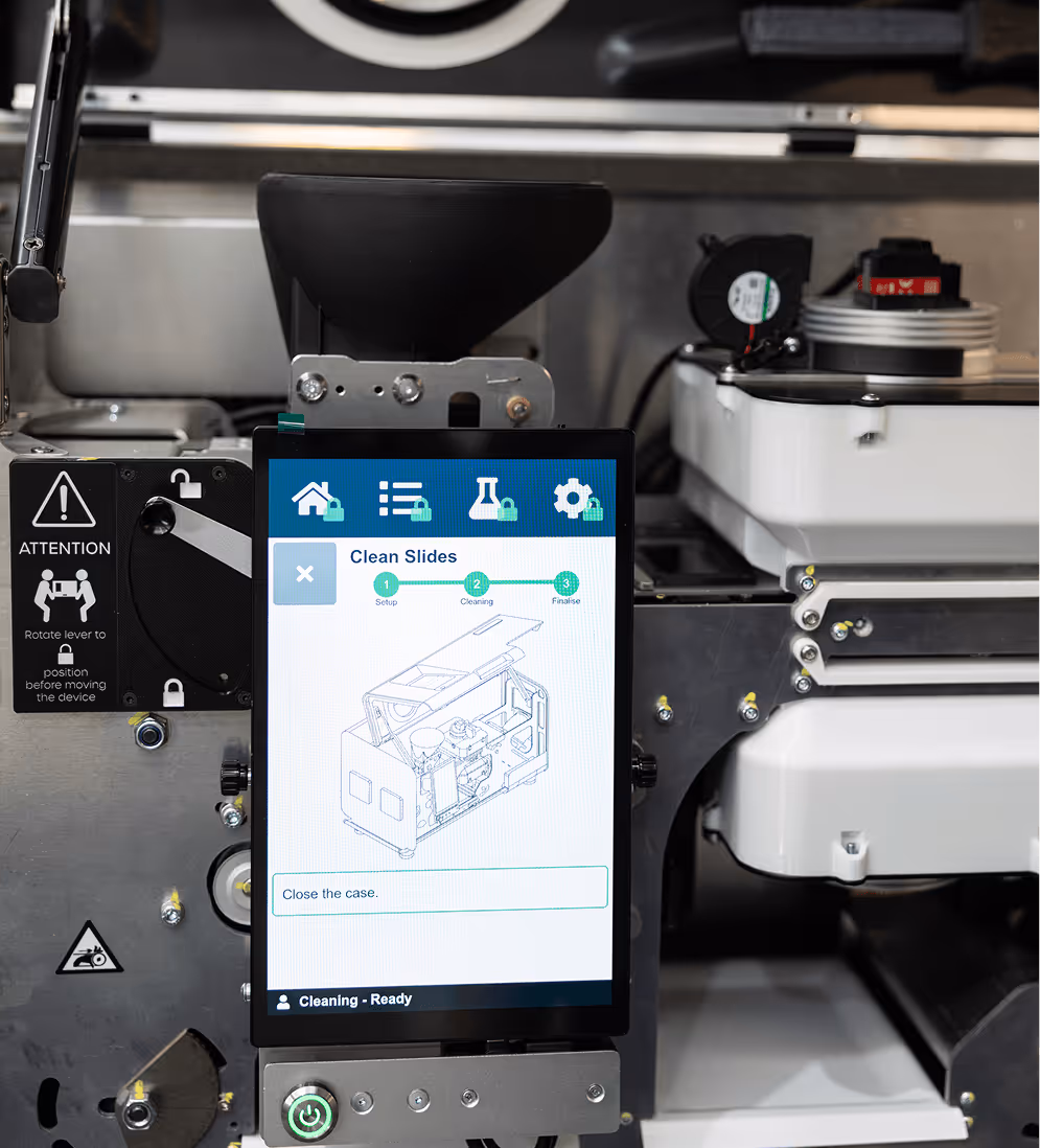 Technician using a handheld interface for Acova system diagnostics and data recording.