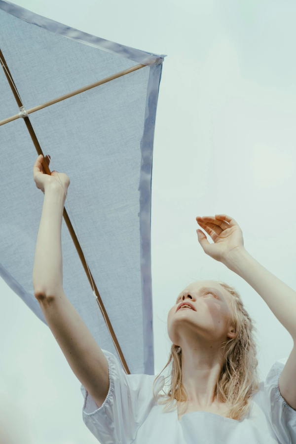 Girl holding a kite