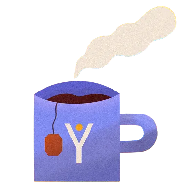 Blue mug with a tea bag and steam rising from hot tea, featuring a white letter Y and a yellow dot on the mug.