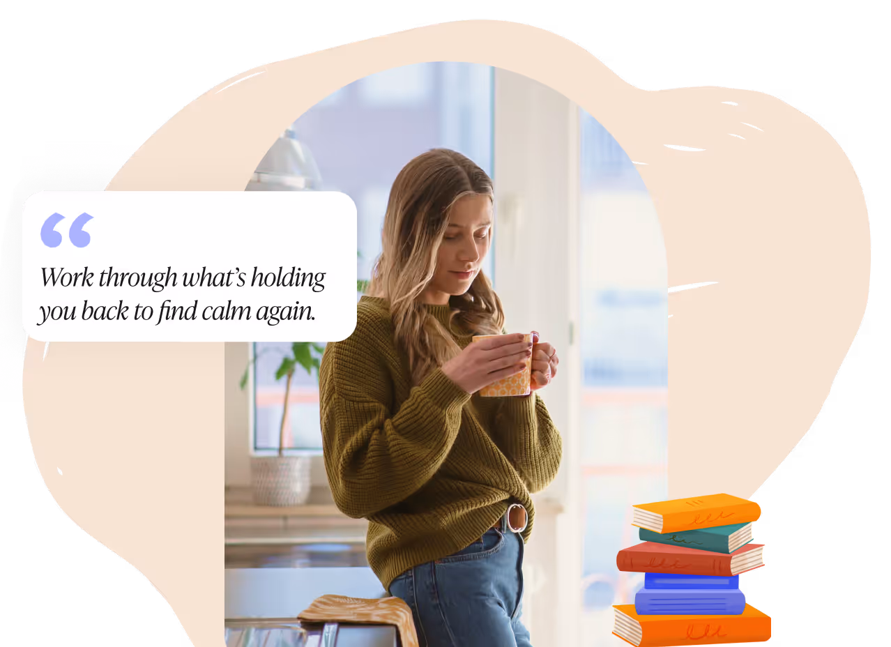Young woman in green sweater holding a mug, standing by a bright window with a stack of colorful books nearby and a quote about finding calm.