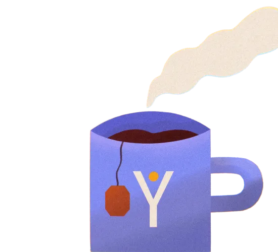 Blue mug with a tea bag and steam rising from hot tea, featuring a white letter Y with an orange dot.