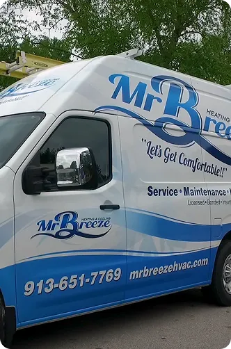 Mr. Breeze HVAC service van featuring contact information and tagline "Let's Get Comfortable!"
