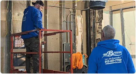Mr. Breez HVAC technicians working on a construction site, ensuring efficient installation and repair services.
