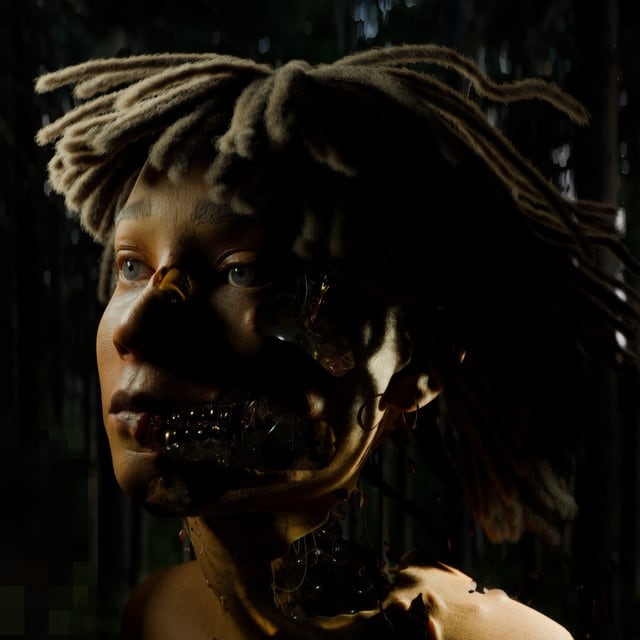 Close-up of a humanoid figure with realistic skin and dreadlocks, partially revealing mechanical components beneath its translucent face and neck of ADES THE PLANET