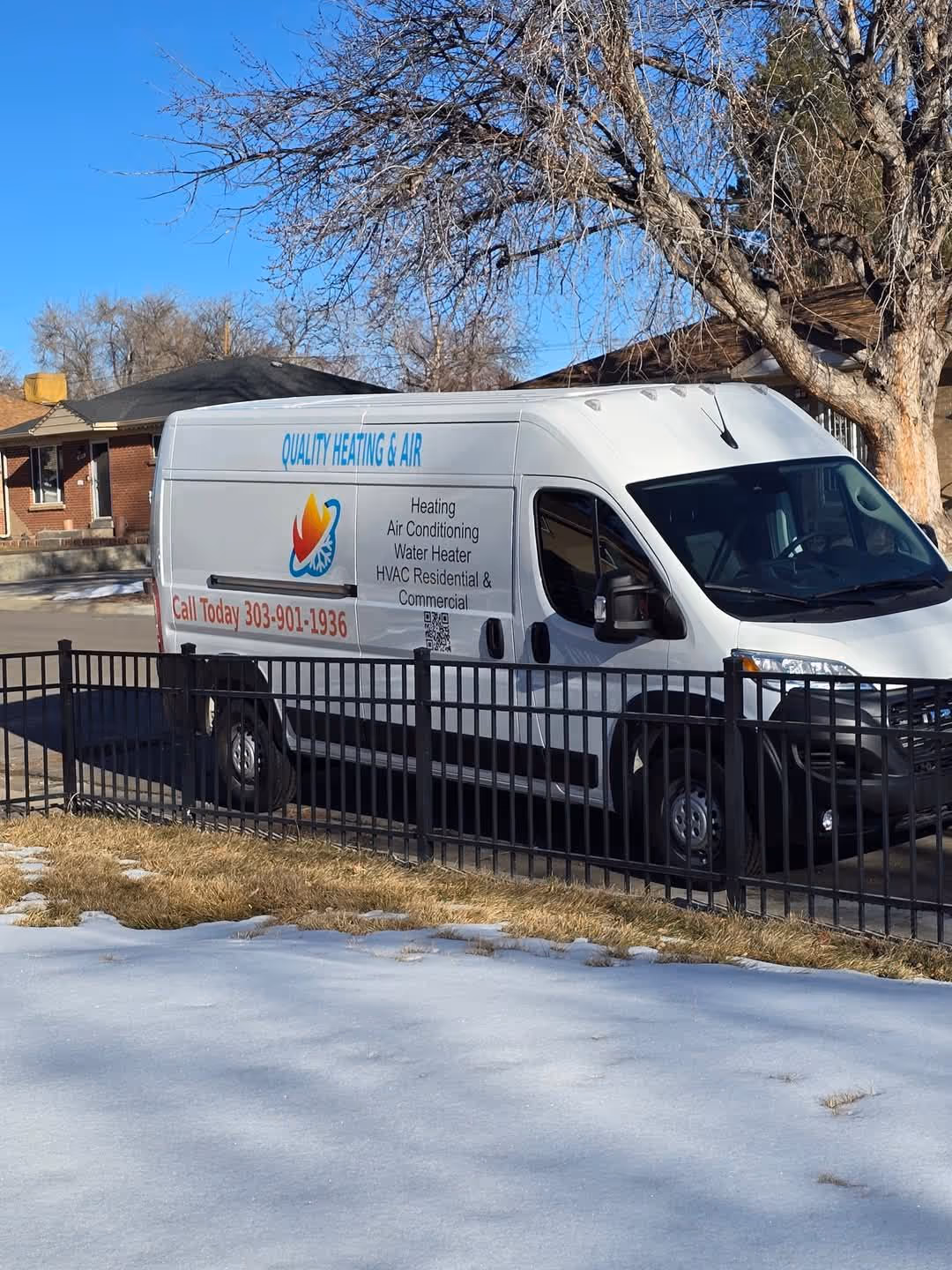 First Response Heating and Cooling truck with 24/7 service parked outside house