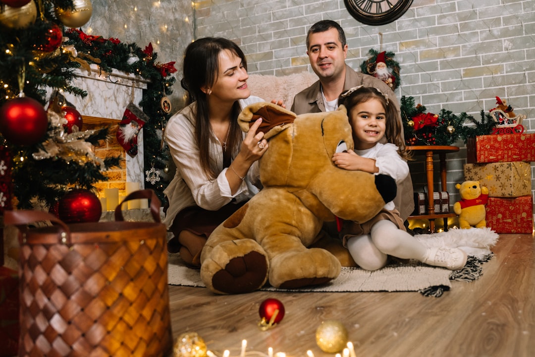 happy family enjoying a warm, comfortable living room in winter, surrounded by cozy blankets and soft lighting - affordable boiler installation in thornton co