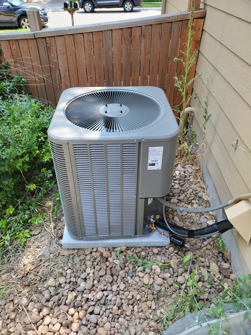 Old air conditioning unit showing signs of wear and tear