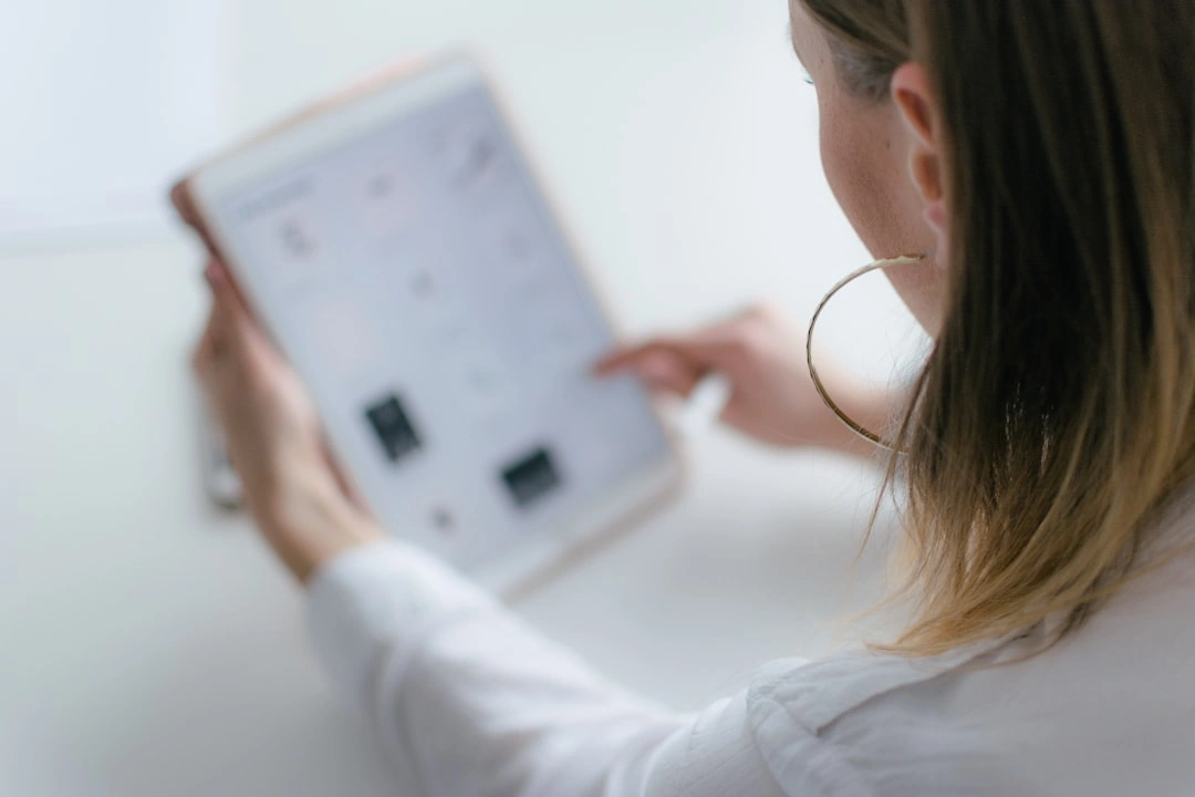 Homeowner calculating expenses on a tablet