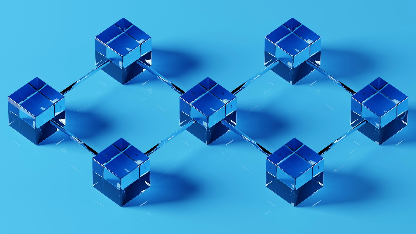 Cubes bleus reliés entre eux, évoquant une chaîne de blocs