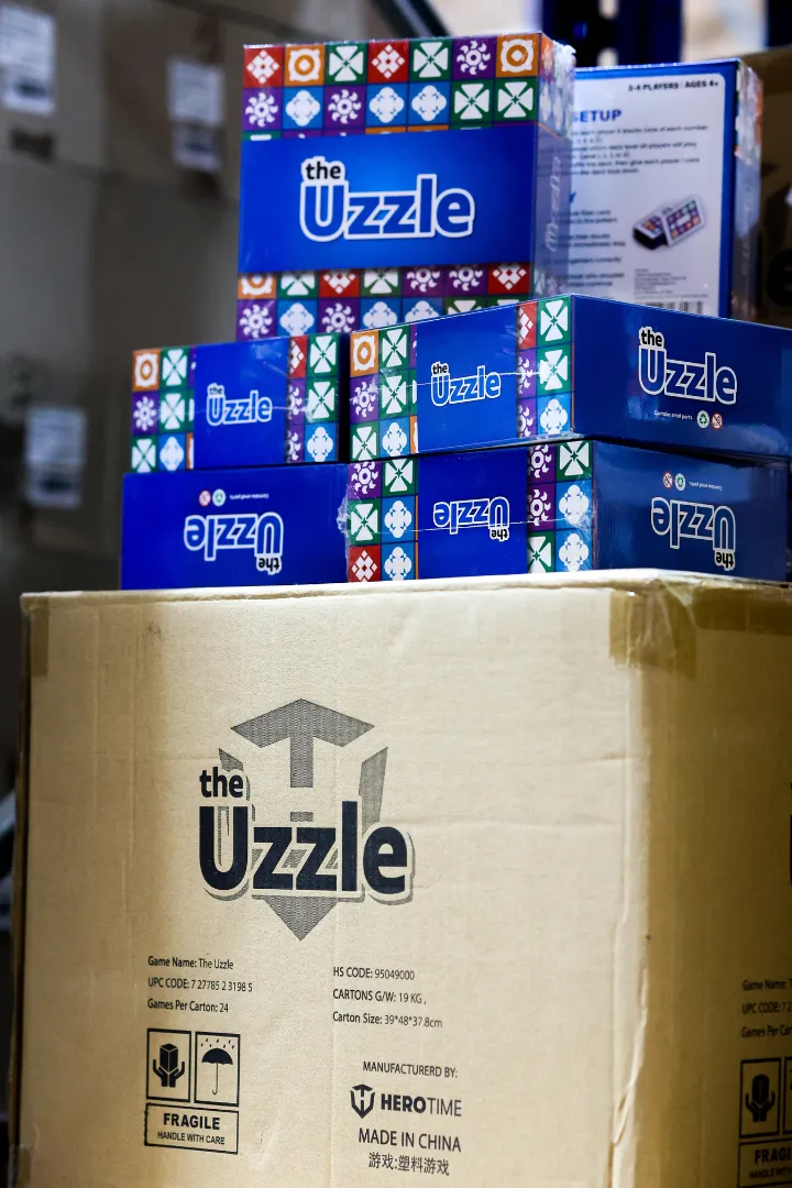 Box with the Uzzle on top