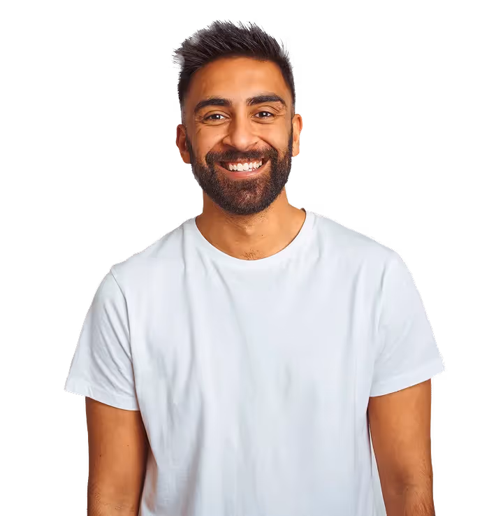 Smiling man with dark hair and beard wearing a plain white t-shirt against a transparent background.