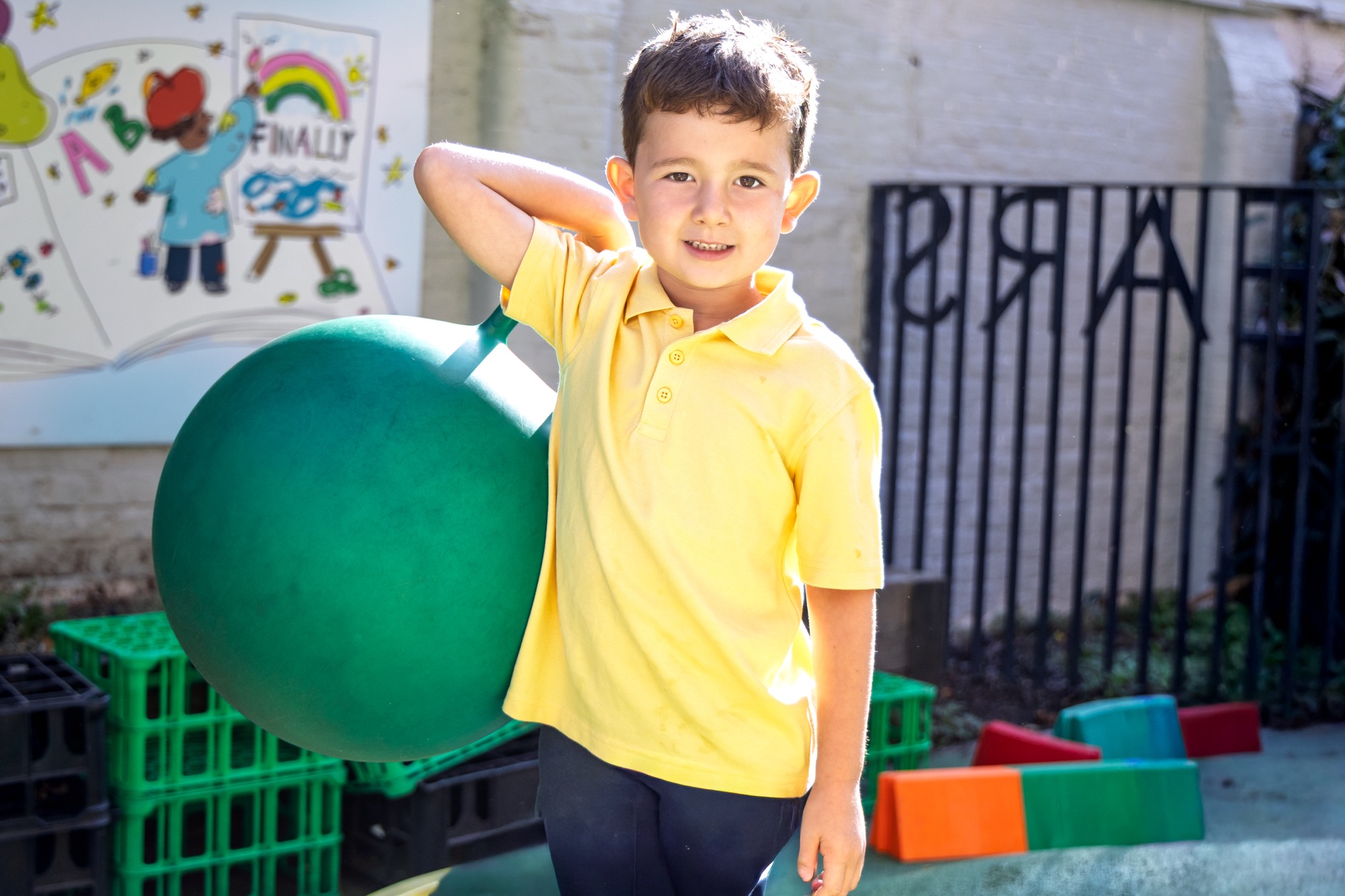A child holding a spacehopper