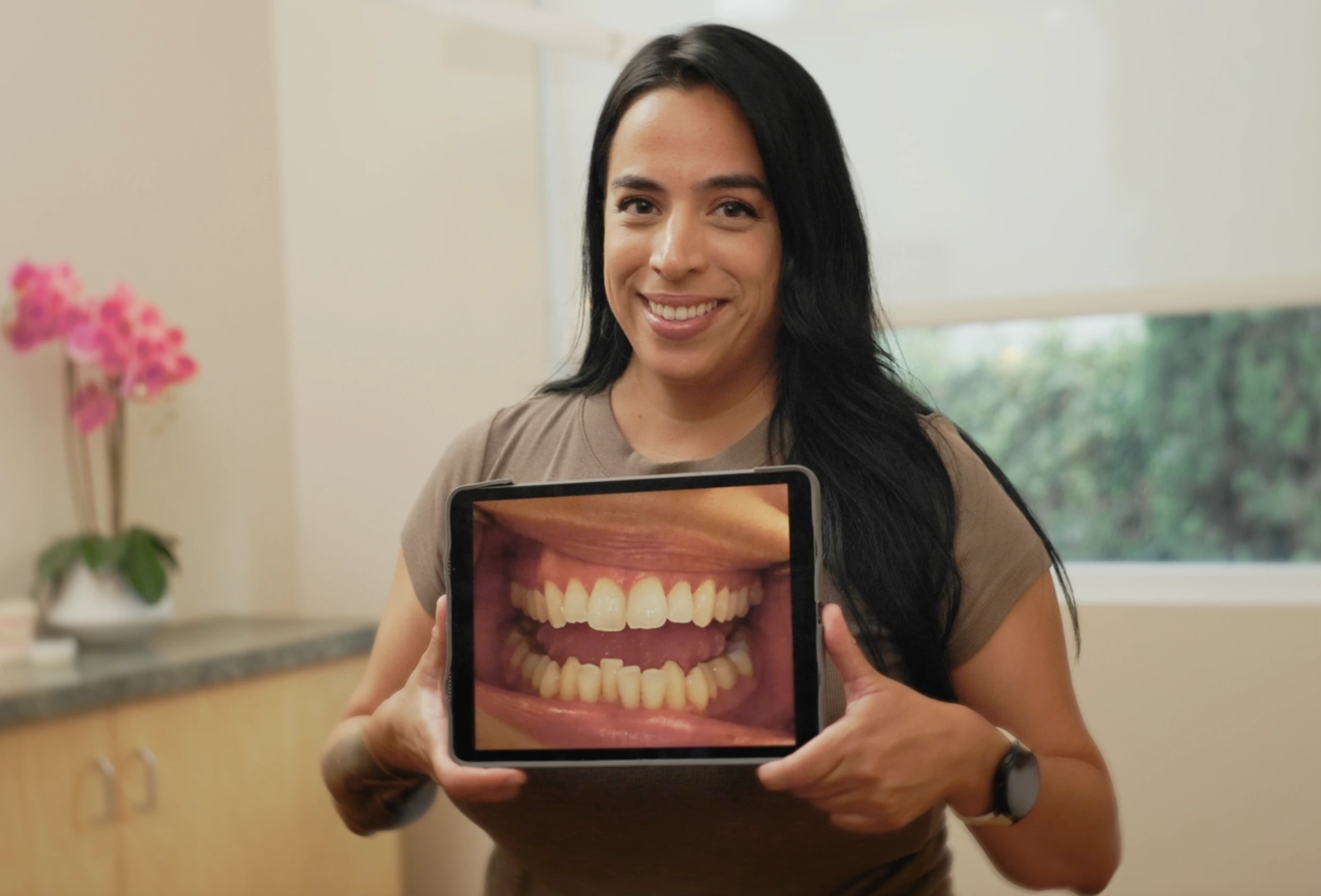 "After he did the extensive work on my teeth, he talked about Invisalign. I never thought having straight teeth was even possible! Dr. Sean gave me a reason to smile again." — Seham A.