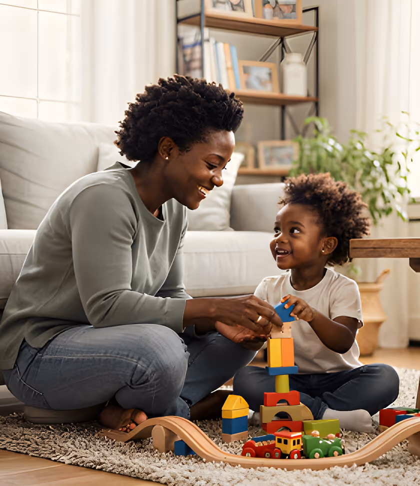 Parent helping child learn developmental skills through educational play