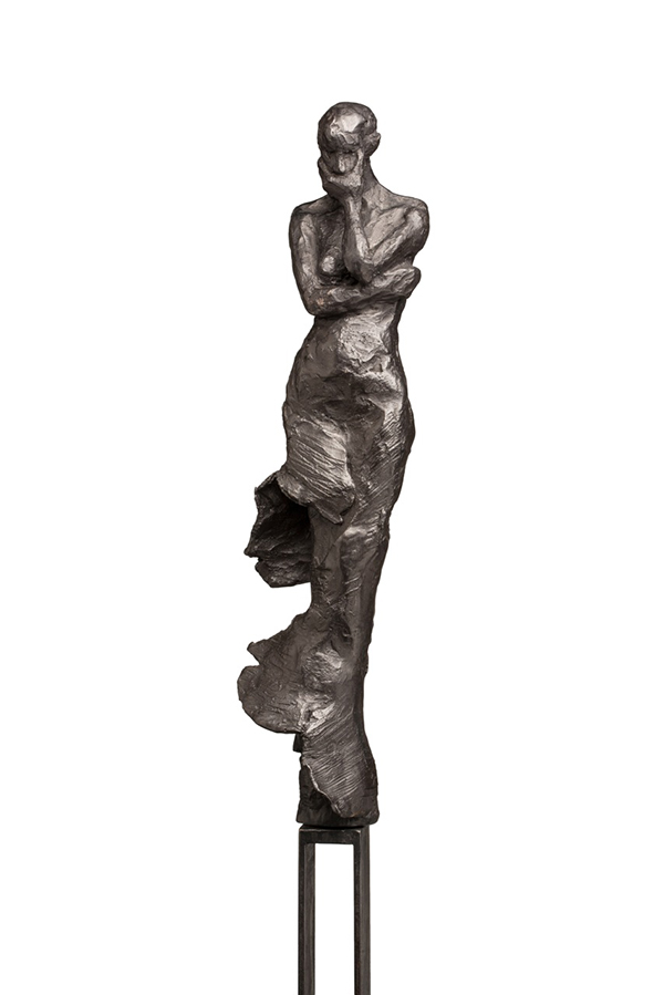 Bronze garden sculpture of a woman by belgian artist Anne De Mol.