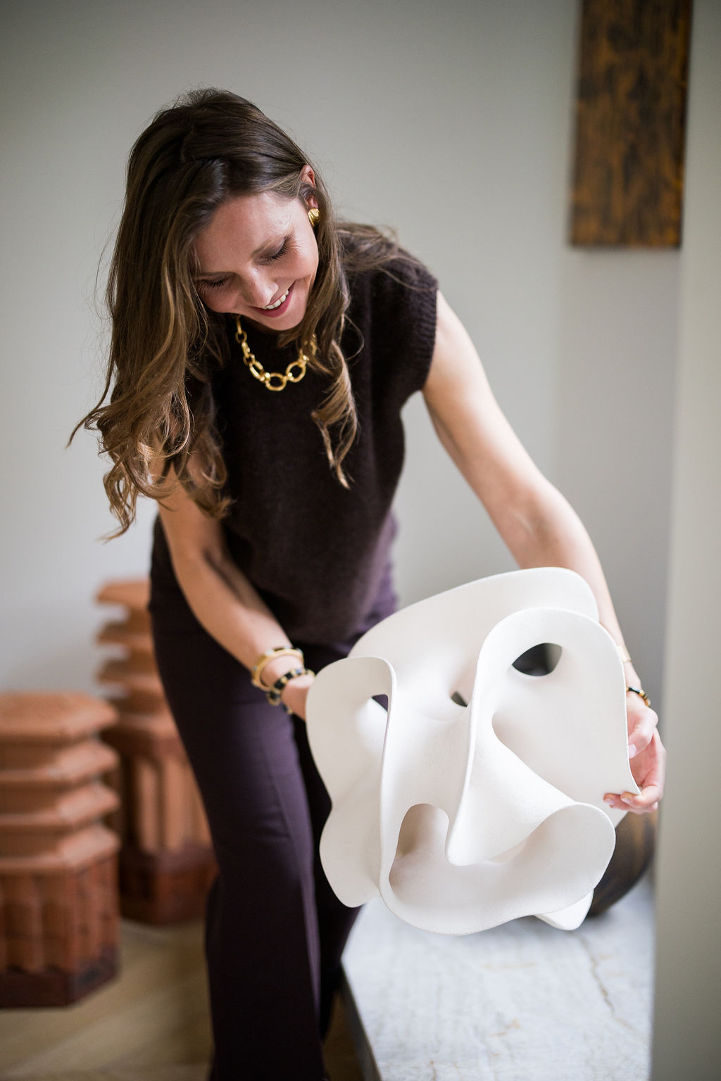 White organic ceramic sculpture by Liliane Demeester presented inside an elegant contemporary art-filled interior. with alexia werrie