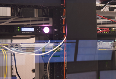 An image of computer servers in the rack.