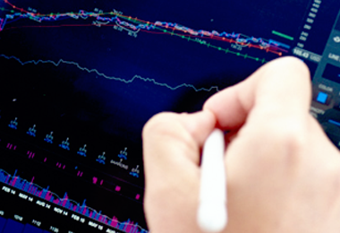 An image of a hand marking up a chart on a iPad.