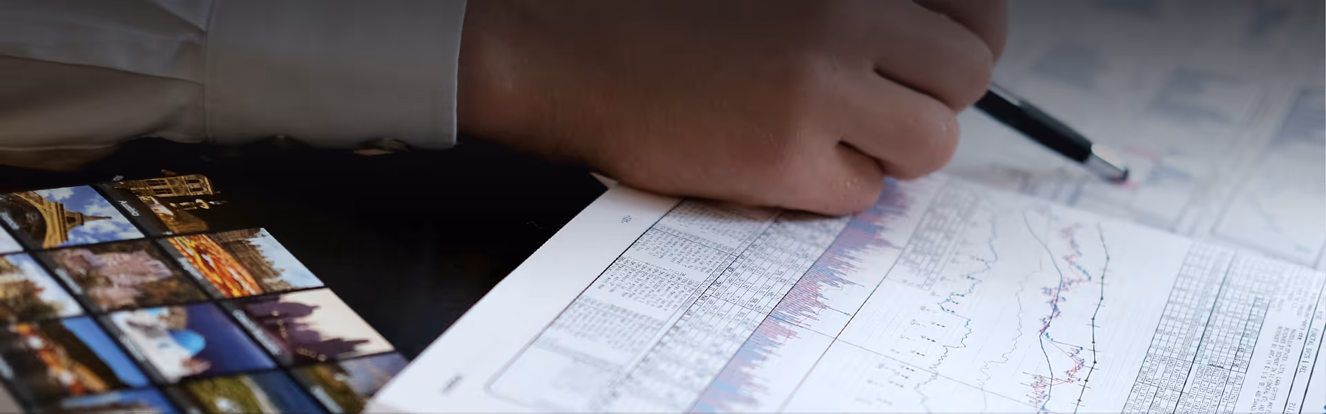 An images of someone going through the William O'Neil Focus List book.