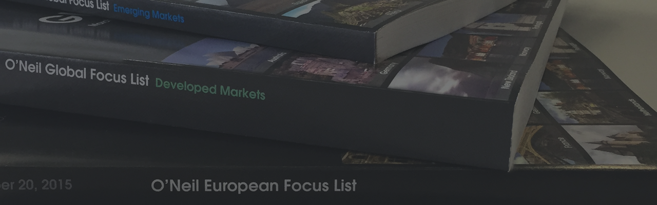 A image of a stack of William O'Neil Focus List books on a table.