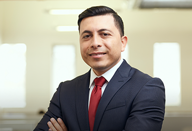 An image of Research Analyst Director Romeo Alvarez.