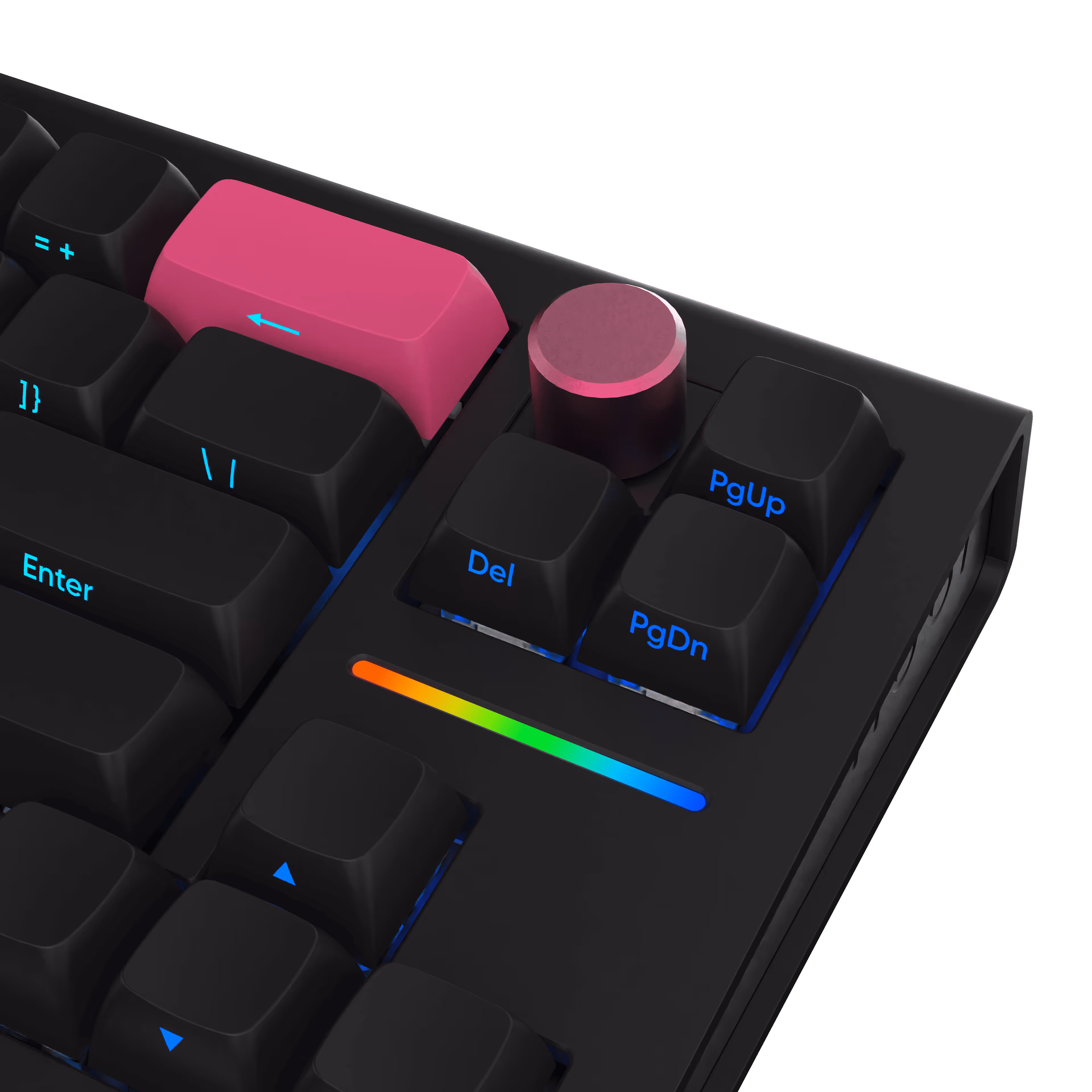 Close-up of a black mechanical keyboard showing pink backspace key and volume control knob with blue backlit keys.