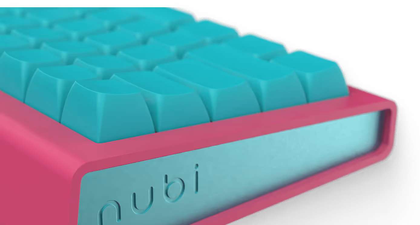 Close-up of a white keyboard showing keys I, O, P, K, and L with green backlighting.