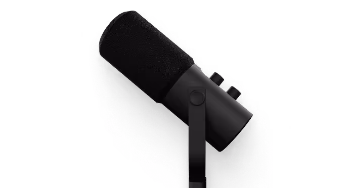 Black professional studio microphone on adjustable mount with foam windscreen.