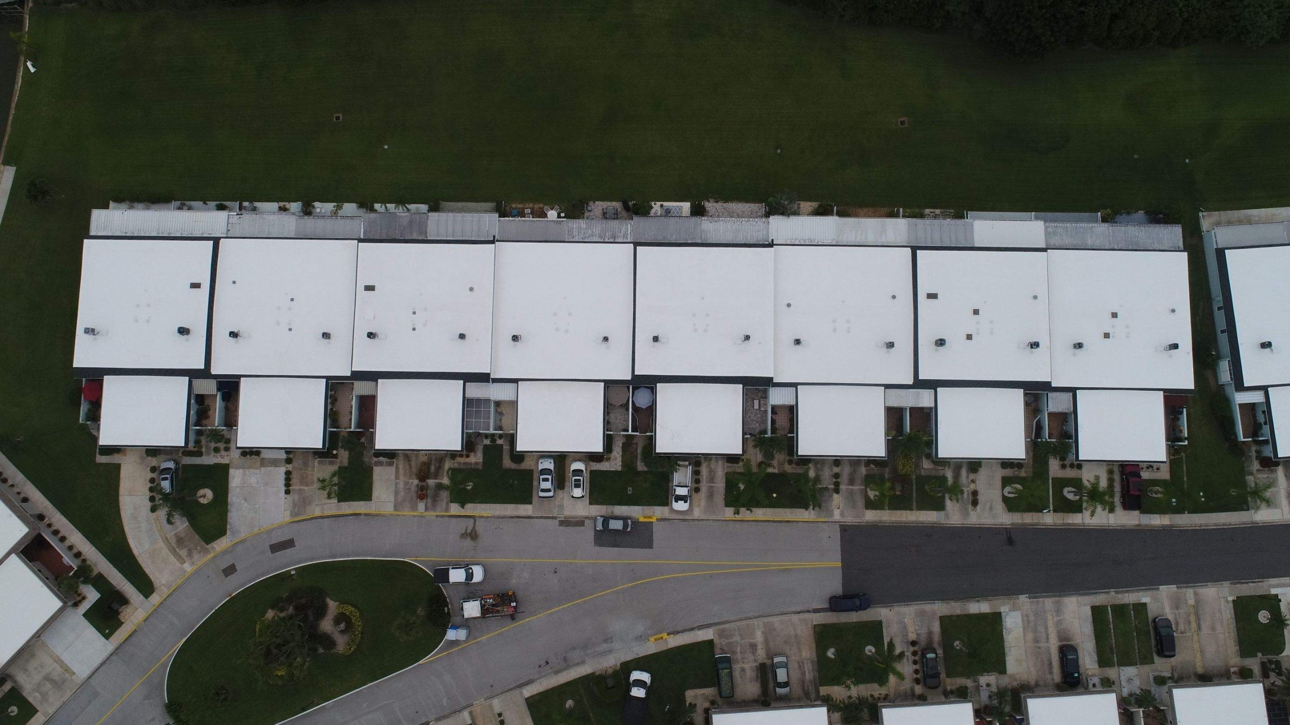 Flat commercial roof with skylights in daylight