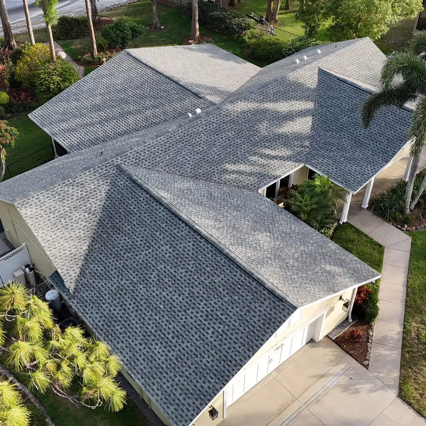 residential roofing Tampa team installing new roof on local home
