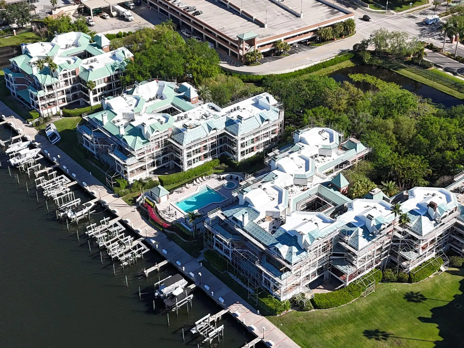 roofing company Tampa skilled team working on residential roof project