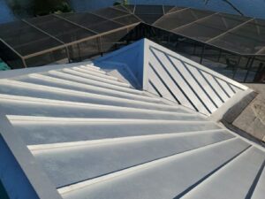 flat roof repair on commercial property by roofing company Tampa