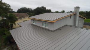 roofing company Tampa workers installing durable residential roof shingles