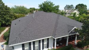 Home with dark gray asphalt shingle roof installation