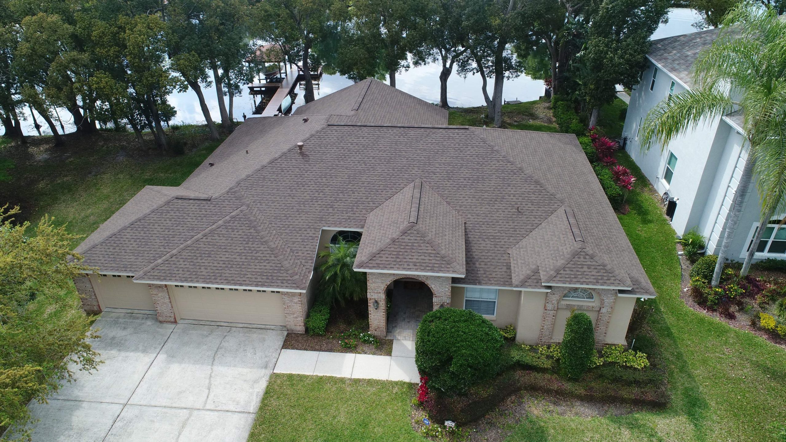 Professional roofer repairing roof leak