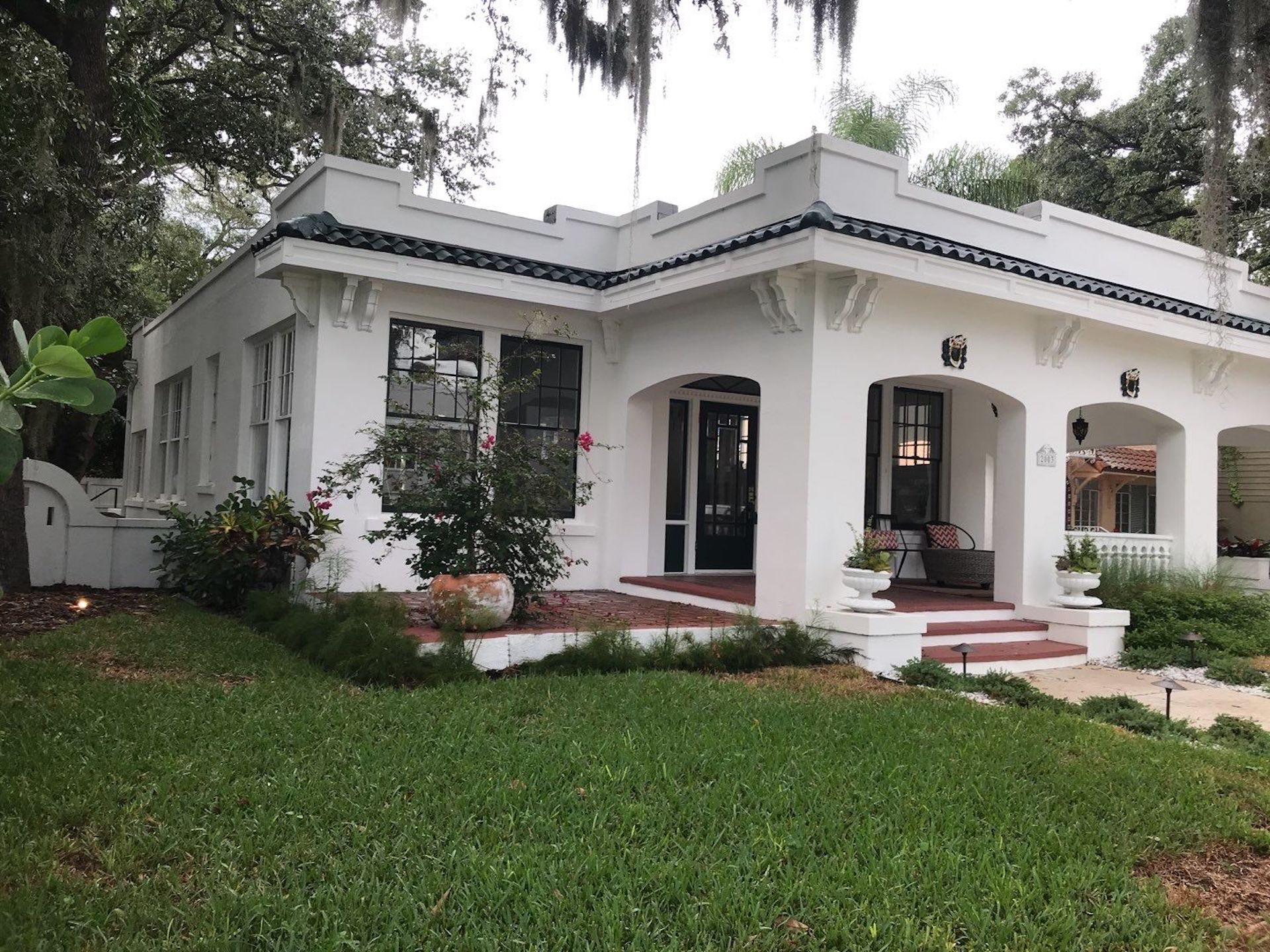 Tampa roofing company team installing durable roof system