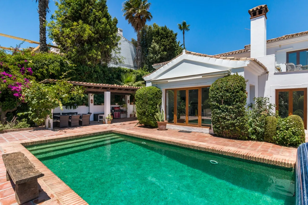 Casa Zana exterior with swimming pool, terrace and landscaped garden