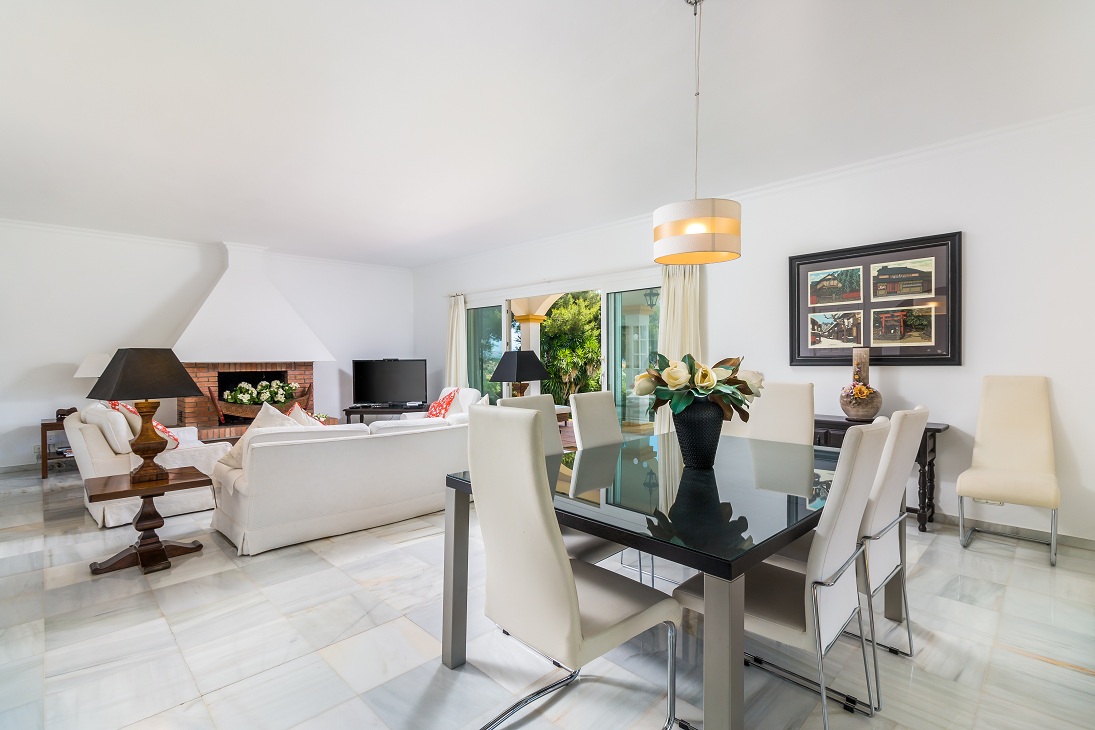 Dining area with table, chairs and open-plan kitchen access