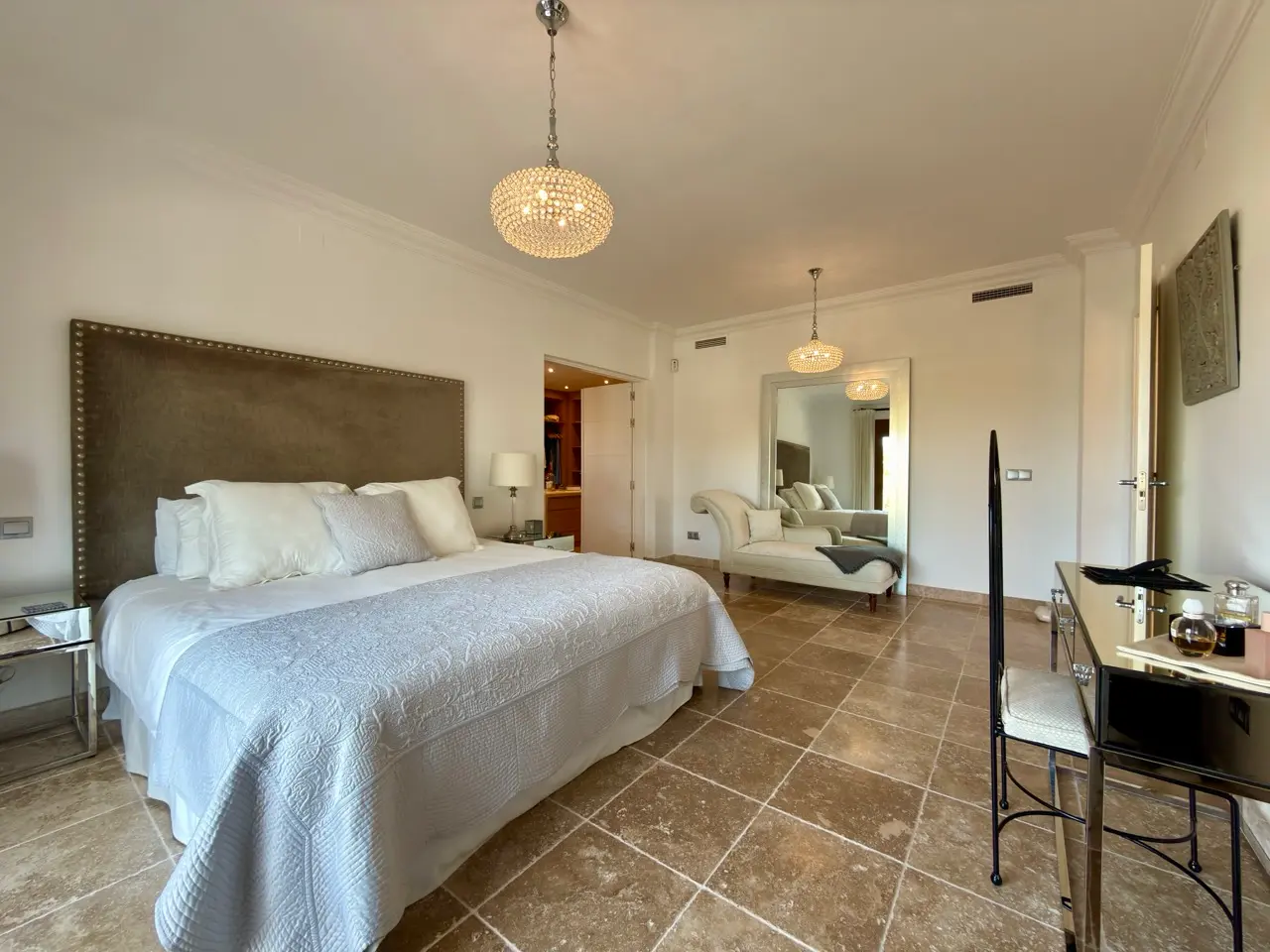 Bedroom with double bed, built-in wardrobe and natural light