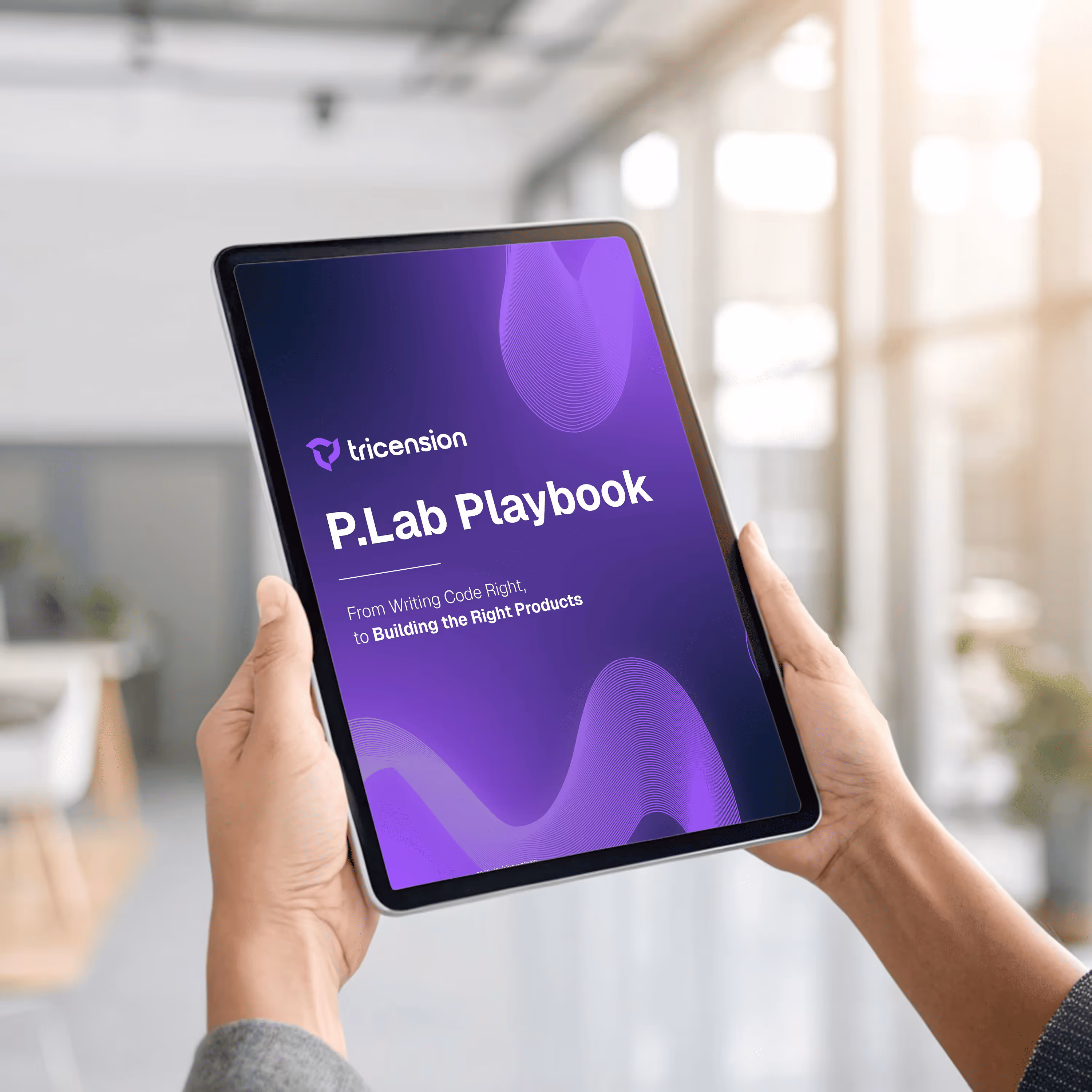 Person holding a tablet displaying a purple screen titled 'P.Lab Playbook' by Tricension with the subtitle 'From Writing Code Right, to Building the Right Products.'