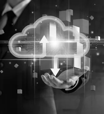 Hand beneath a glowing cloud icon with upward and downward arrows symbolizing cloud data transfer, overlaid on a businessperson in a suit.