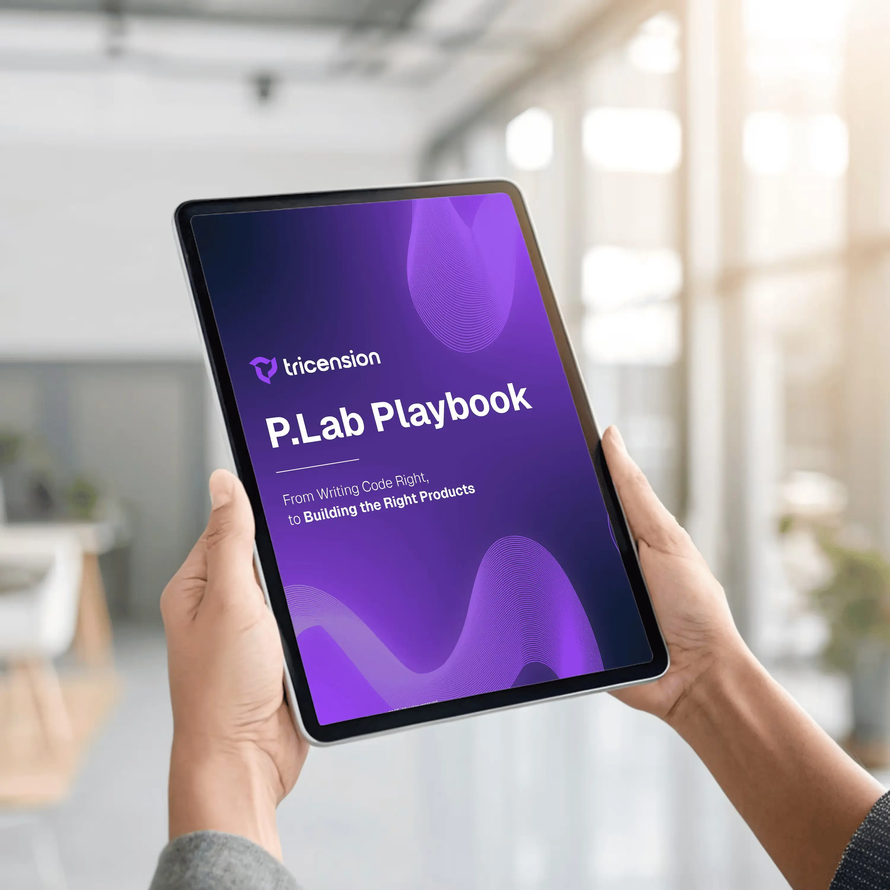 Two hands holding a tablet displaying the cover of 'P.Lab Playbook' by tricenision with the subtitle, 'From Writing Code Right, to Building the Right Products' on a purple background.
