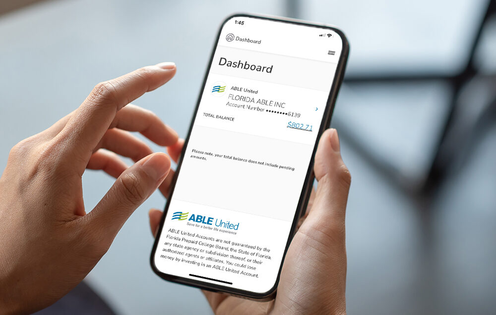 Someone using their ABLE United account on their phone