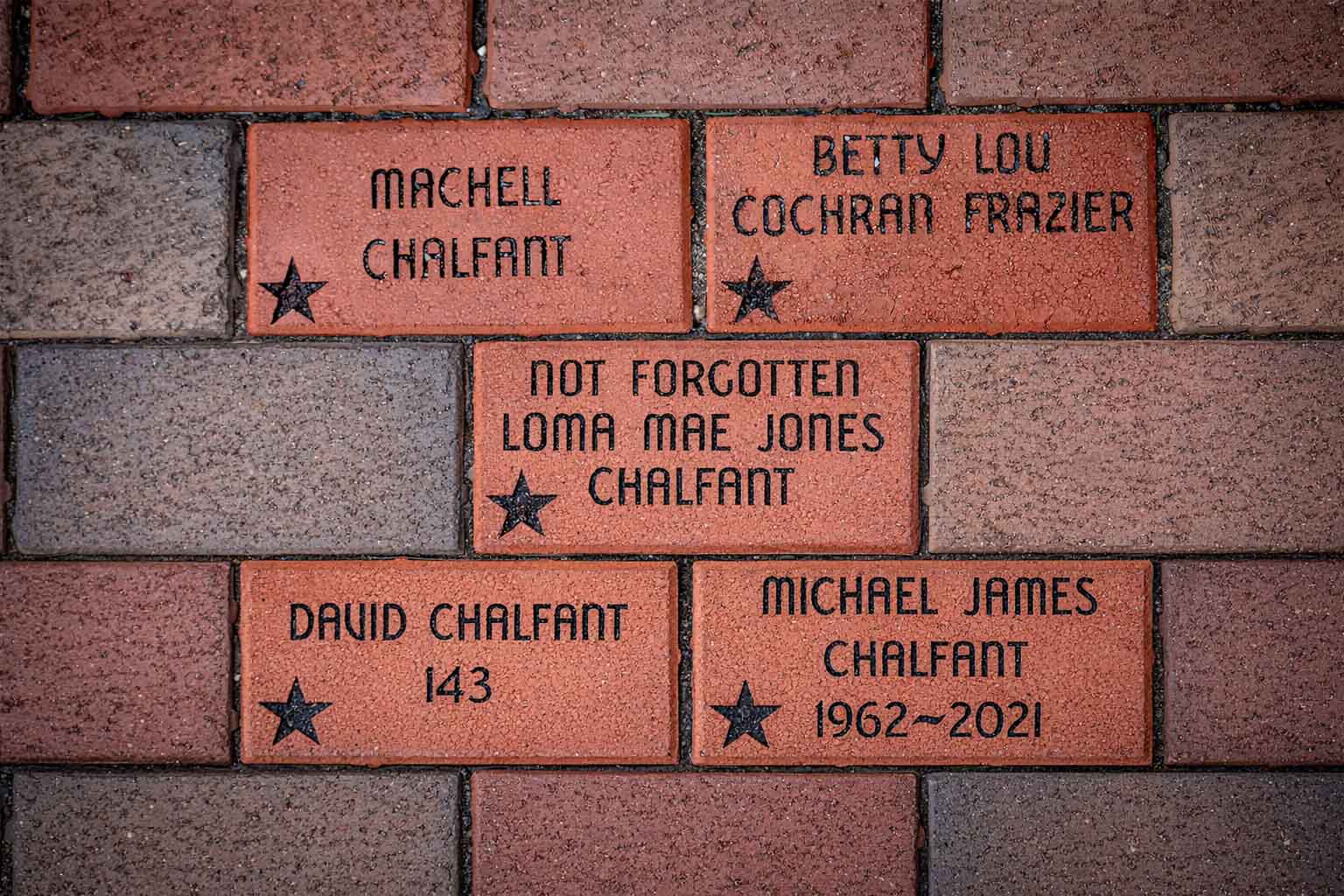 Brick memorial with names on the walk of fame in front of The Paramount Theatre.