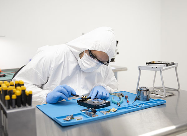 data recovery specialist fixing hard drive