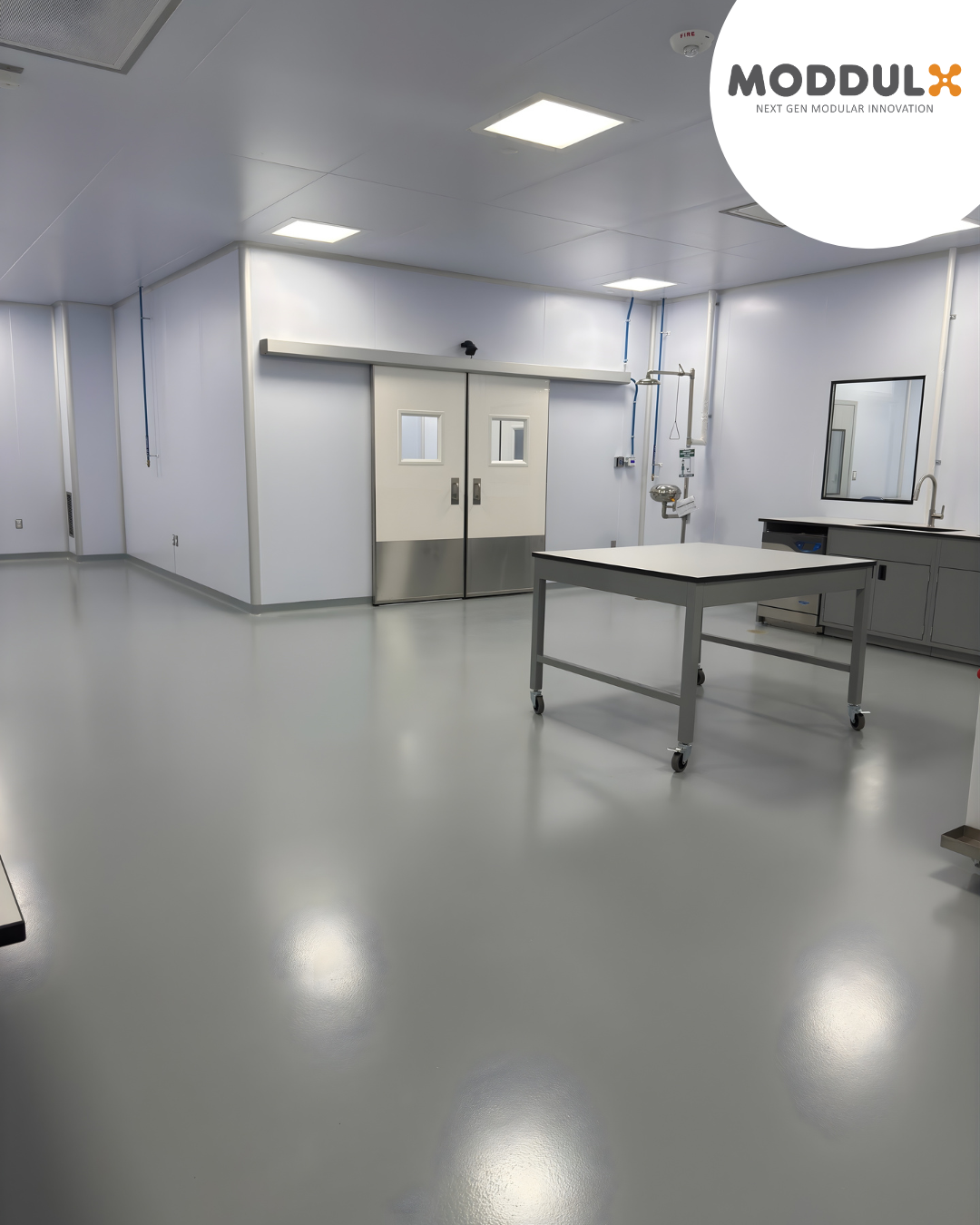 Hygienic modular wall panels and cleanroom workstations in a food processing facility