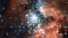 Bright star cluster surrounded by colorful cosmic dust and nebula in space.