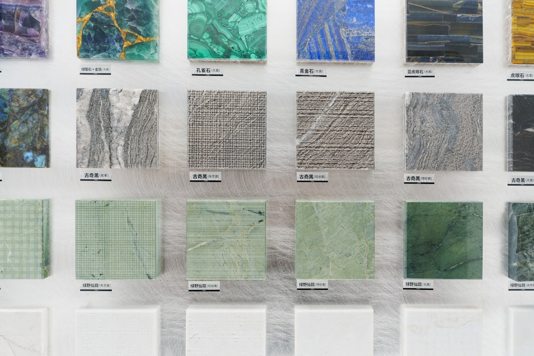 various stone facade textures and colors on a sample board - retaining wall stone facade