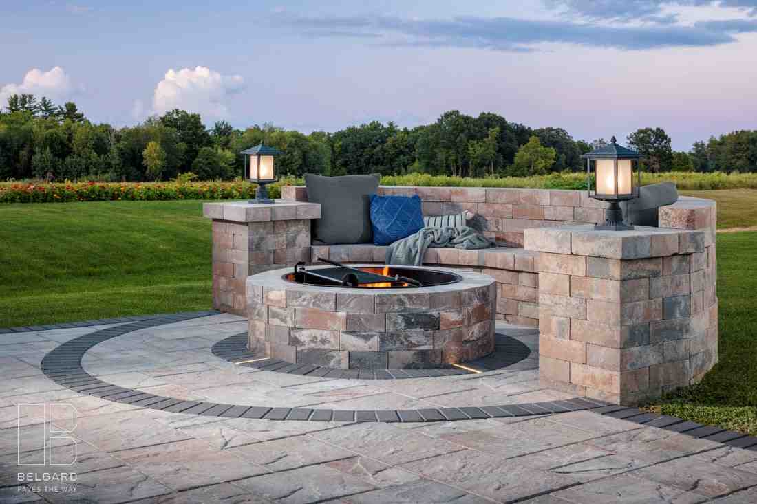 infographic showing the top 5 benefits of outdoor fire features: year-round enjoyment with extended outdoor season statistics, natural gathering hub for social connection, increased home value by up to 20 percent, ambient warmth and lighting for cooler evenings, and architectural focal point that enhances curb appeal - how fire features enhance outdoor living spaces